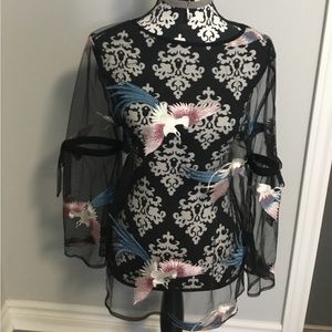 Sheer blouse, colour black and pink, size medium